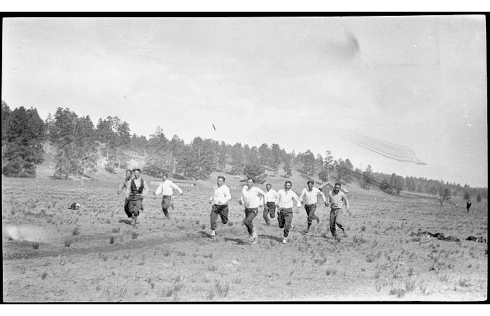 men racing in 1900s